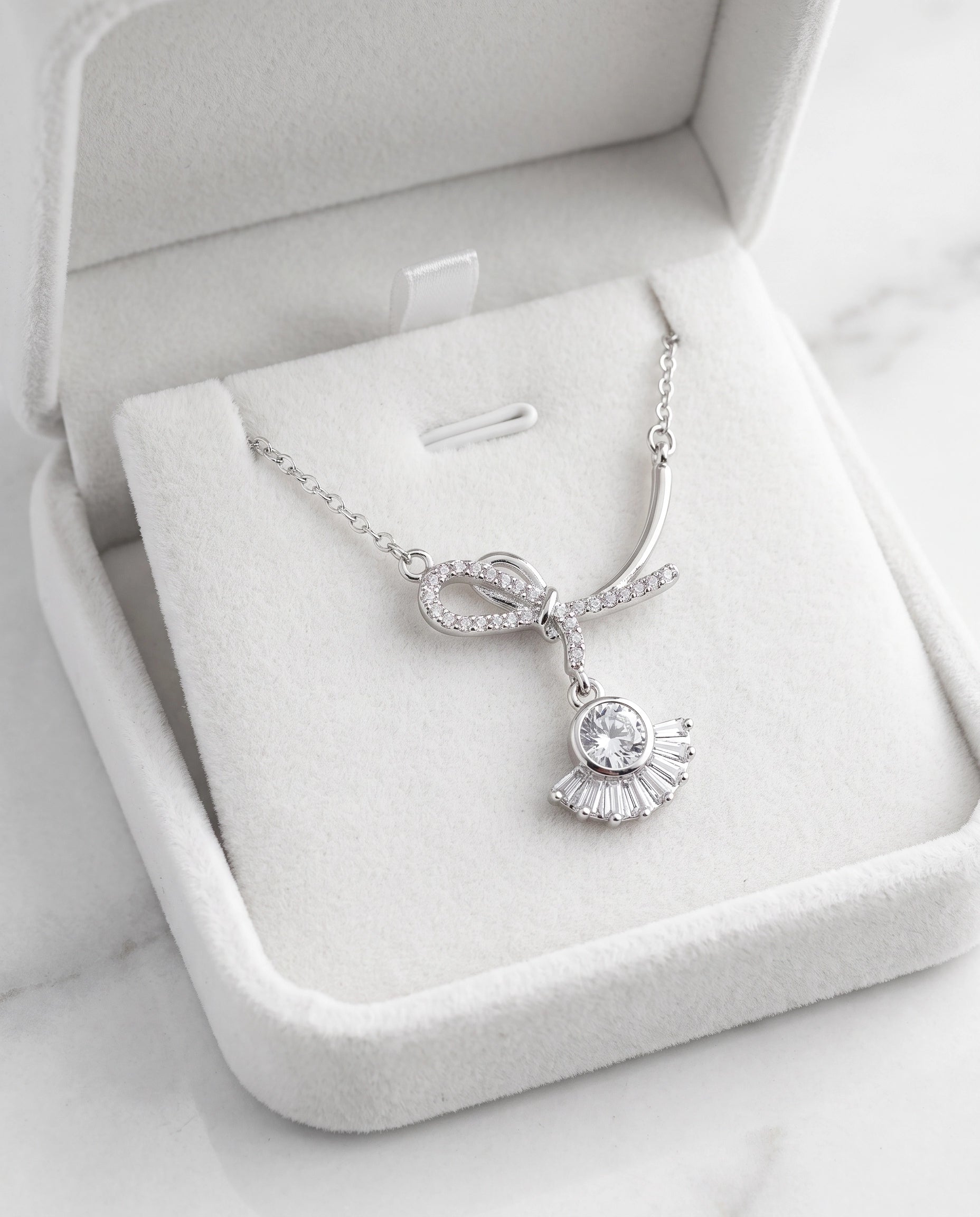 Infinity Bow Crystal Necklace for Women | Available in Silver, Blue & Black | Elegant Pendant Necklace | Gift for Her | EveStone