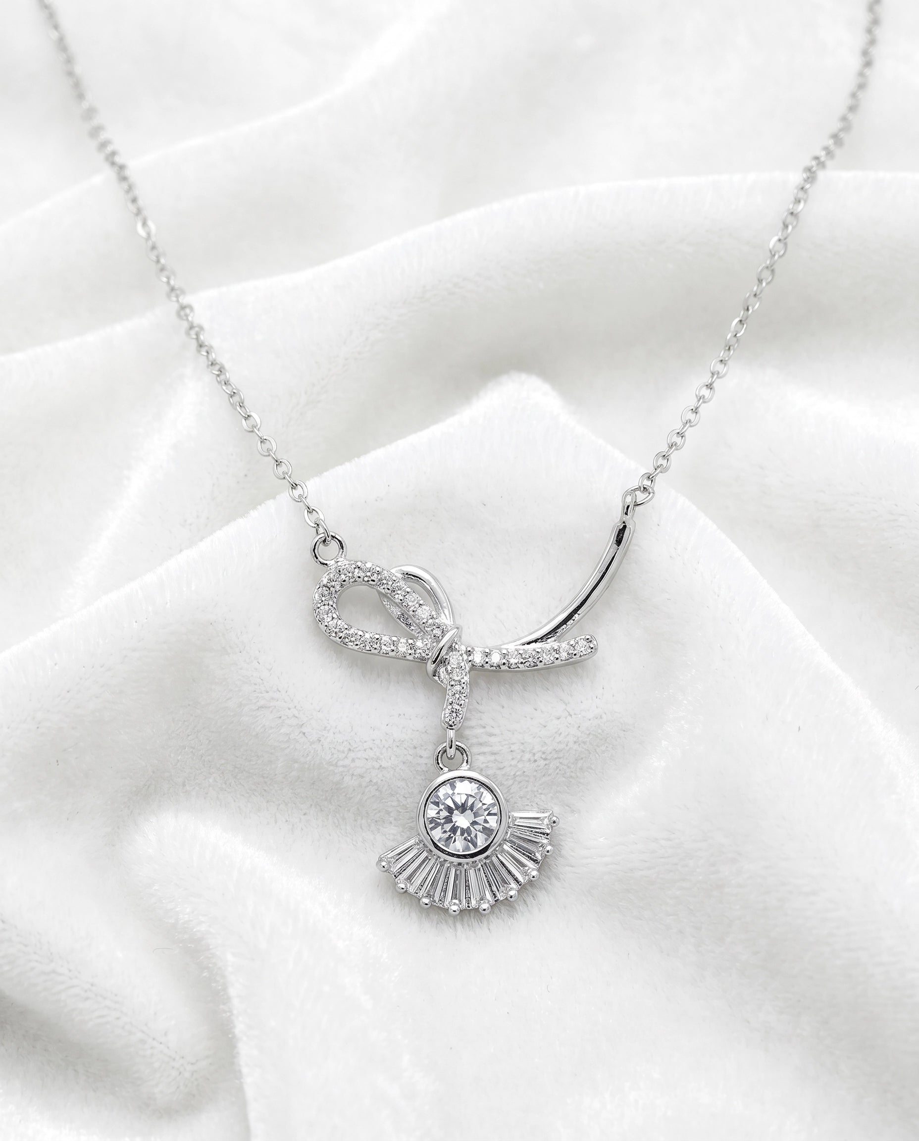 Infinity Bow Crystal Necklace for Women | Available in Silver, Blue & Black | Elegant Pendant Necklace | Gift for Her | EveStone